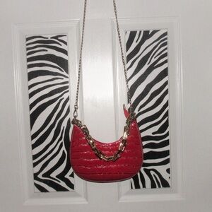 Red croc print shoulder bag with gold chain and zipper closure